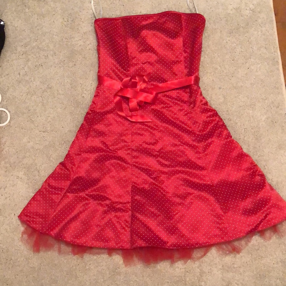Fun Silky strapless dress. Size 5. Tule ruffle trim under skirt.